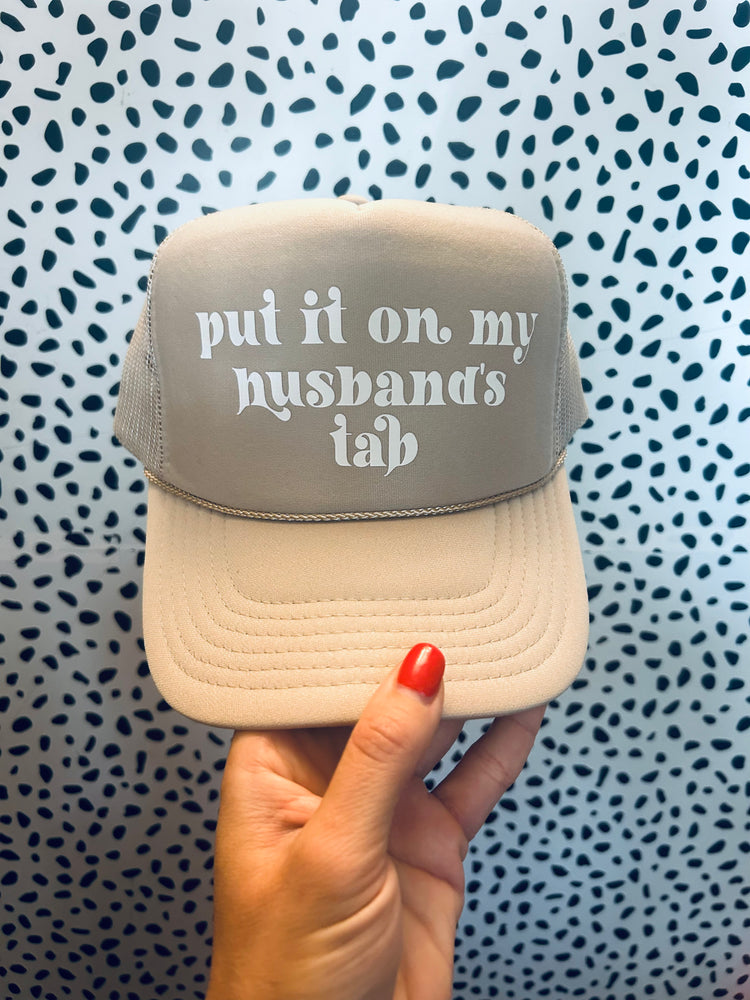 Put It On My Husband's Tab Trucker Hat